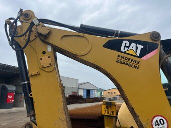 CATERPILLAR 428 E 4X4 - 12