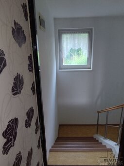 RD se zahrádkou a 2x garáží v obci Přílepy. - 12