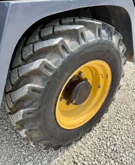 KLOUBOVÝ NAKLADAČ KOMATSU WA 75 - 12