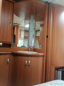 Karavan Hobby 560 UFe, rv 09 mover - 12