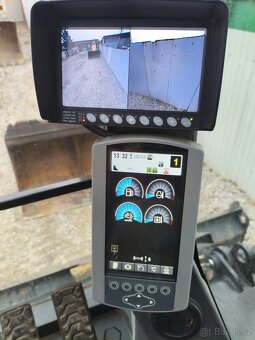 Kolový otočný bagr CAT M316 F - 12