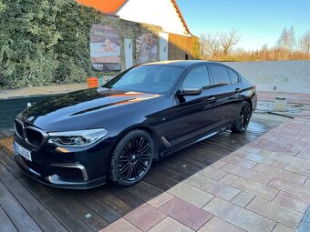 BMW M550i xDrive - 12