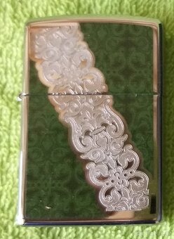 Predám ZIPPO ZAPAĽOVAČE, KOŽENÉ PÚZDRA A PRÍVESOK-KANISTER N - 12