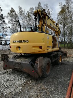Prodám kolový bagr New Holland MH 5.6, 20,5 t, r.v. 2009, 8. - 12