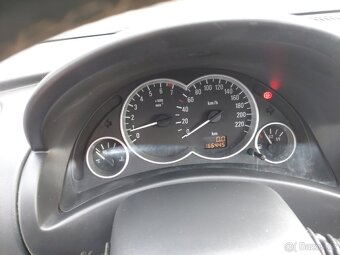 Opel Corsa 1.2i - 12