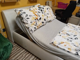 Kvalitní polohovací postel s úložným prostorem - 12
