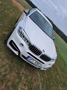 BMW X6 M50d xDrive - 12