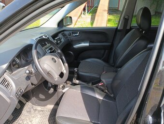 Kia Sportage M121 - 12
