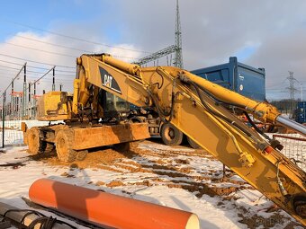 CAT M322C - prasklý blok motoru - 12