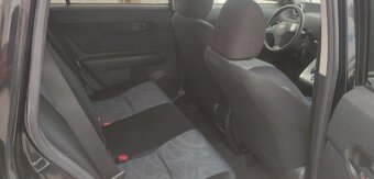 TOYOTA URBAN VERSO COROLLA ( SCION xB ) - 12