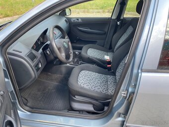 Škoda Fabia 1.2 - 12