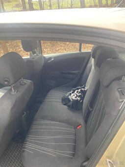 Opel Corsa 1.2i - 12