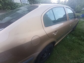 Octavia 1.6 MPI 75 kw - 12