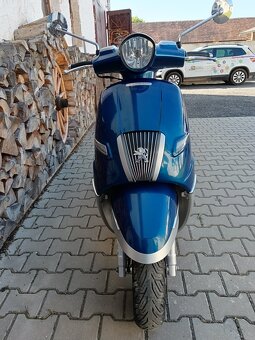 PEUGEOT Django 125 - 12