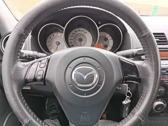 Mazda 3 1,4i klima Nové v ČR 2008 - 12