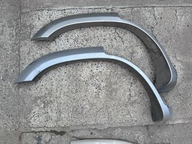 Nissan Patrol Y61 Plastové lemy , zadní nárazník , výztuha - 12