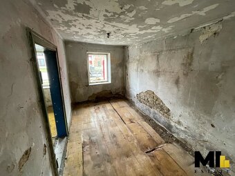 Prodej podílu 1/2 rodinného domu o velikosti 141 m², pozemek - 12