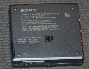 Minidisc Sony MZ-R91, manual, AA adapter, manual, MD disky - 12