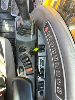 Kolový bagr JCB JS145w - 12