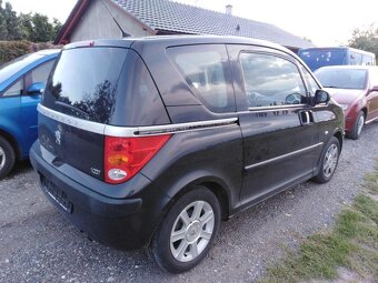 PEUGEOT 1007  NAJETO JEN 70,,, KLIMA, 1,4i  BENZIN 65KW - 12