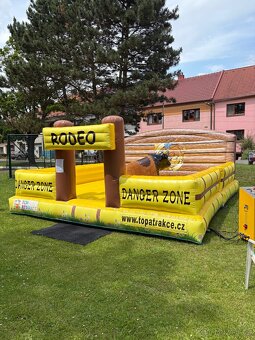 Skákací hrady, skluzavky, kolotoč, rodeo býk - 12