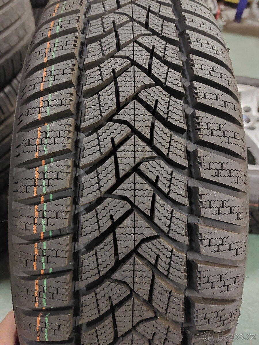 Kompletní hliníková kola 16" na Ford Focus IV. zimní Dunlop - 13