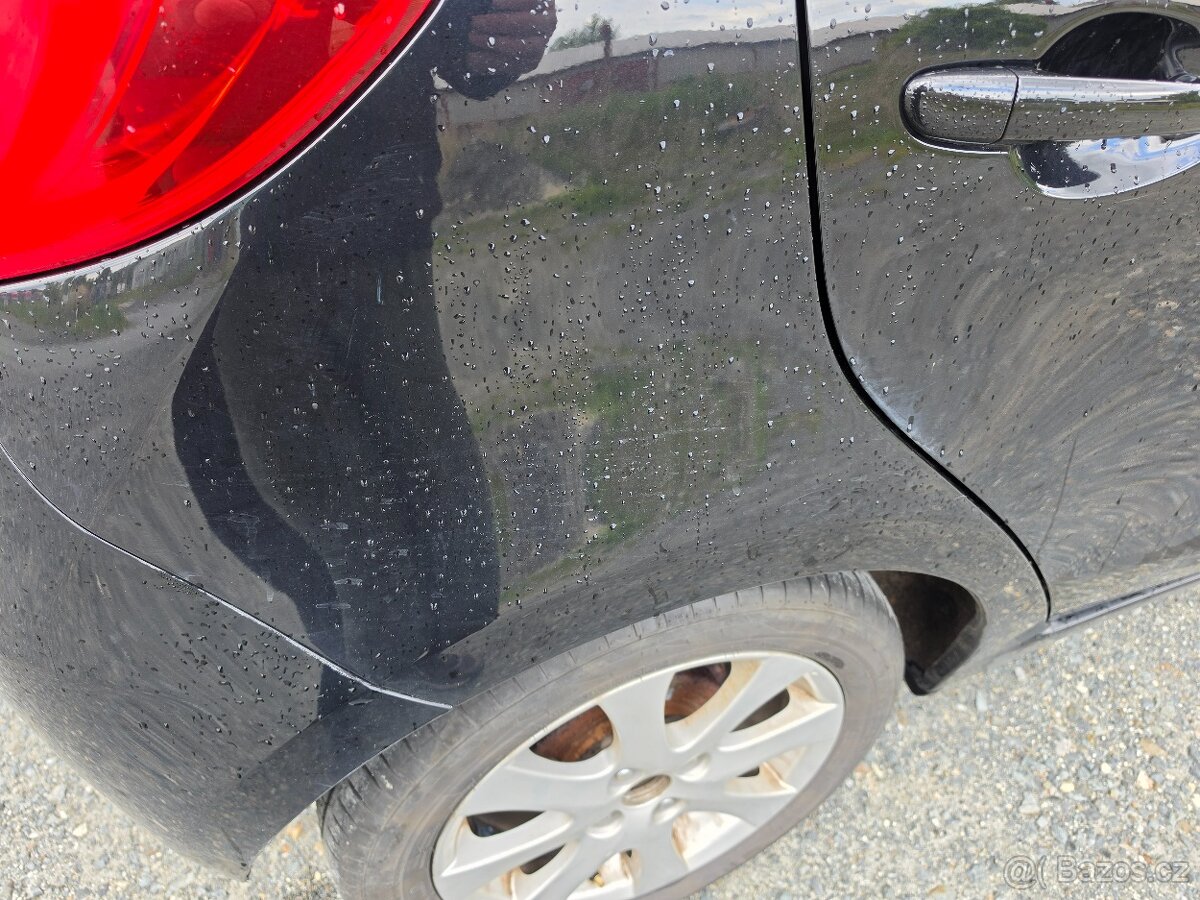 Mazda 2 2010 - 13