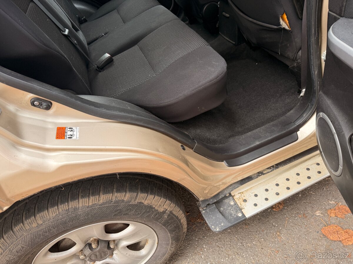 Suzuki Grand Vitara 12/2009 -1,9 d. - 13