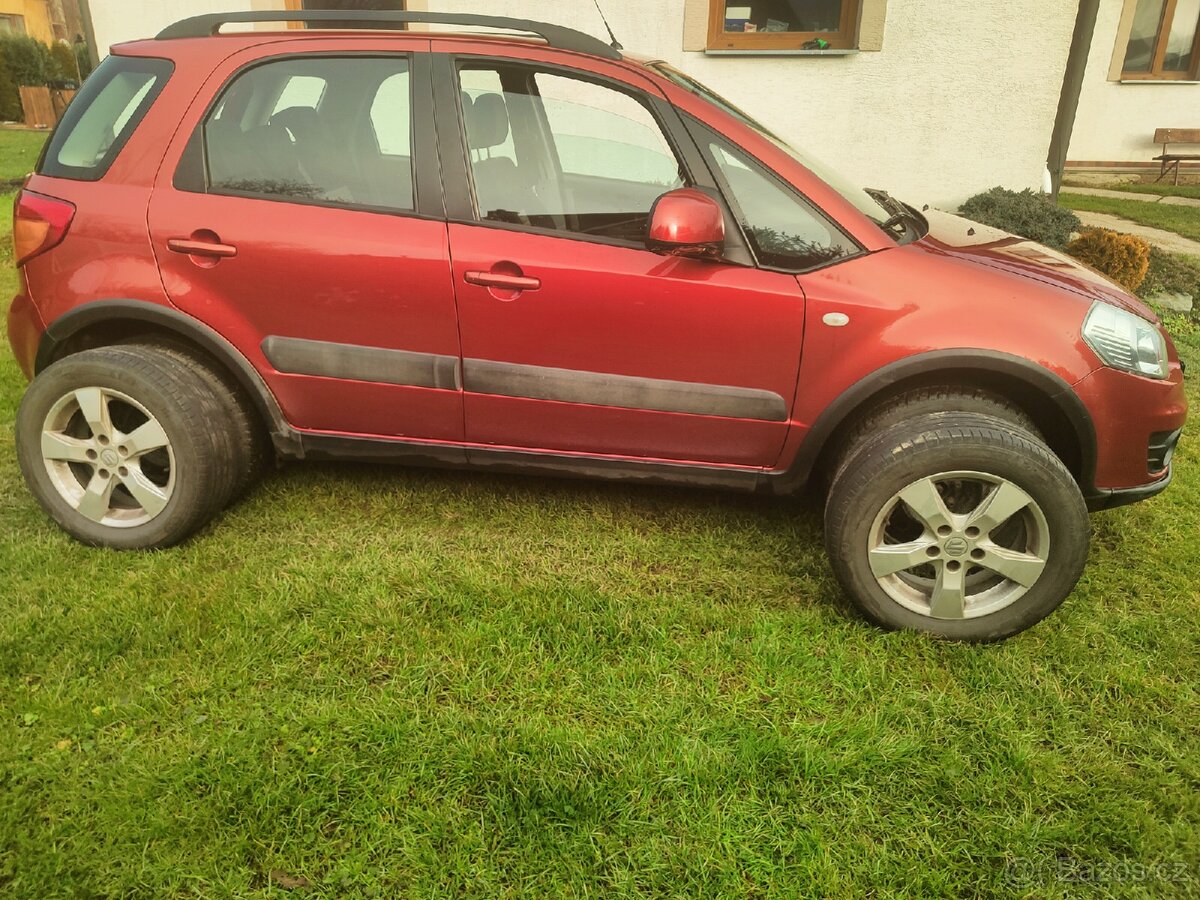 Prodám Suzuki Swift SX4 - 13