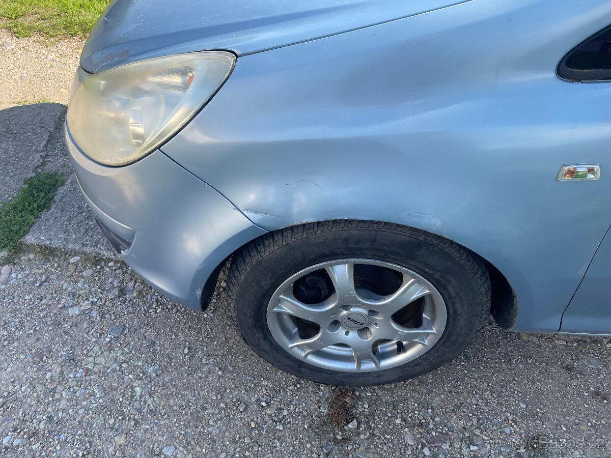 Opel Corsa D 1,2 16V STK do 7.4.2027 - 13