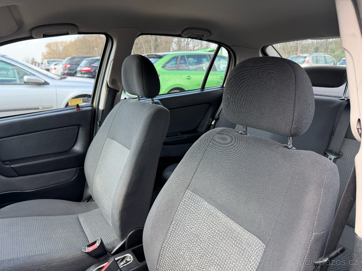 Opel Astra 1.4i - 13