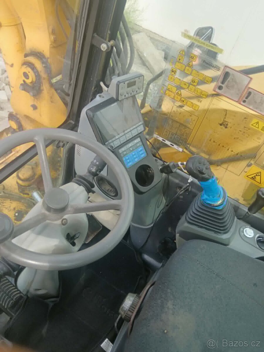 Kolovy bagr komatsu 98 - 13