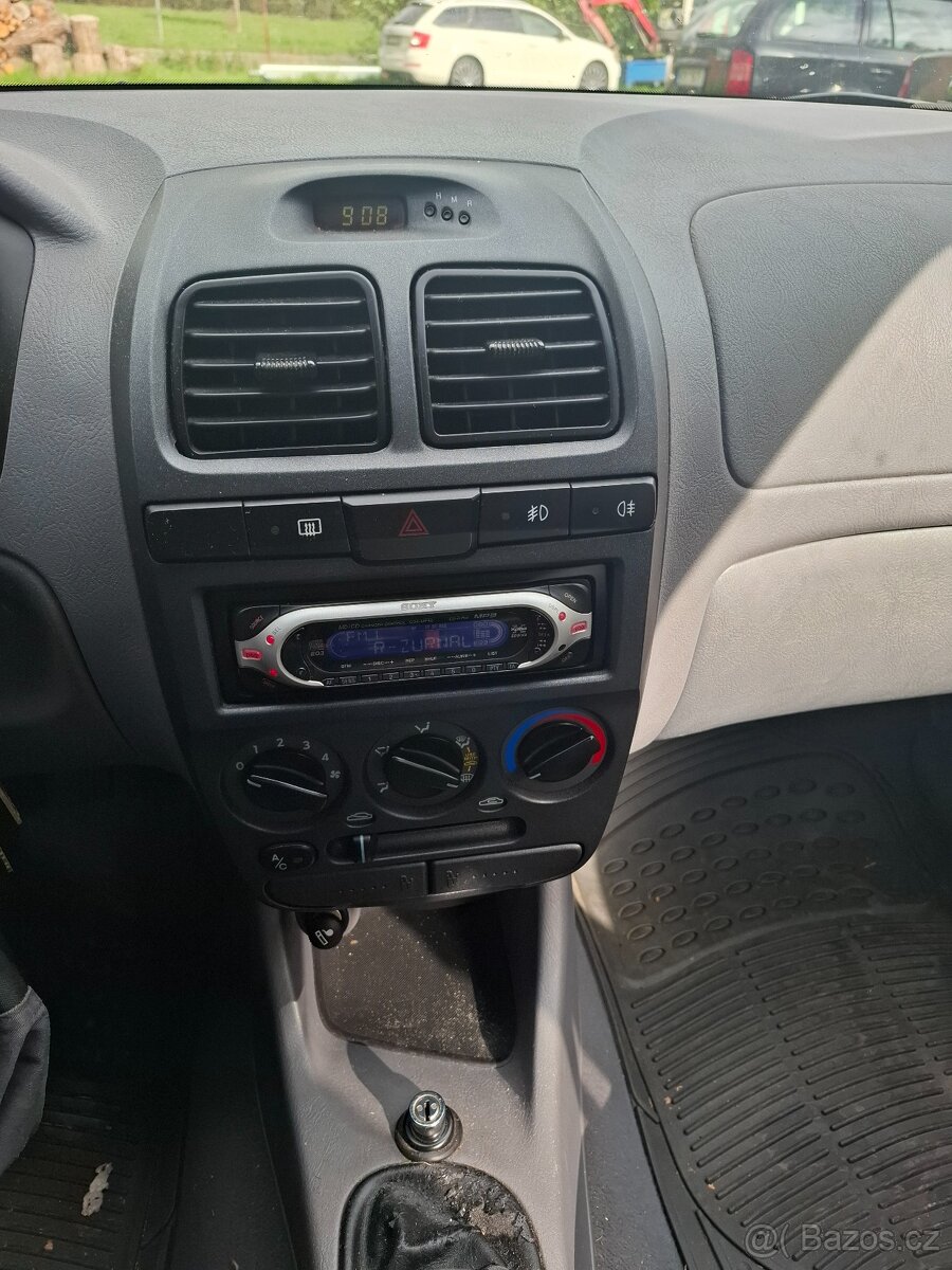Hyundai accent 1,3 63 kW, 2004 - 13