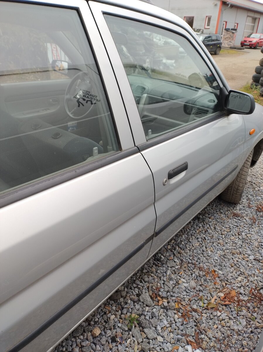 Mazda DEMIO 1,5i 55kW 2001 - DILY - 13