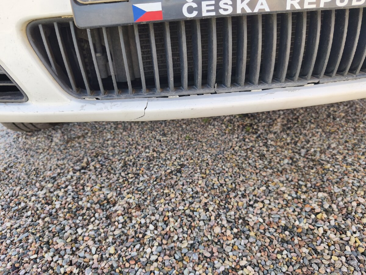 Fabia combi 2006 1,4 74 kw - 13