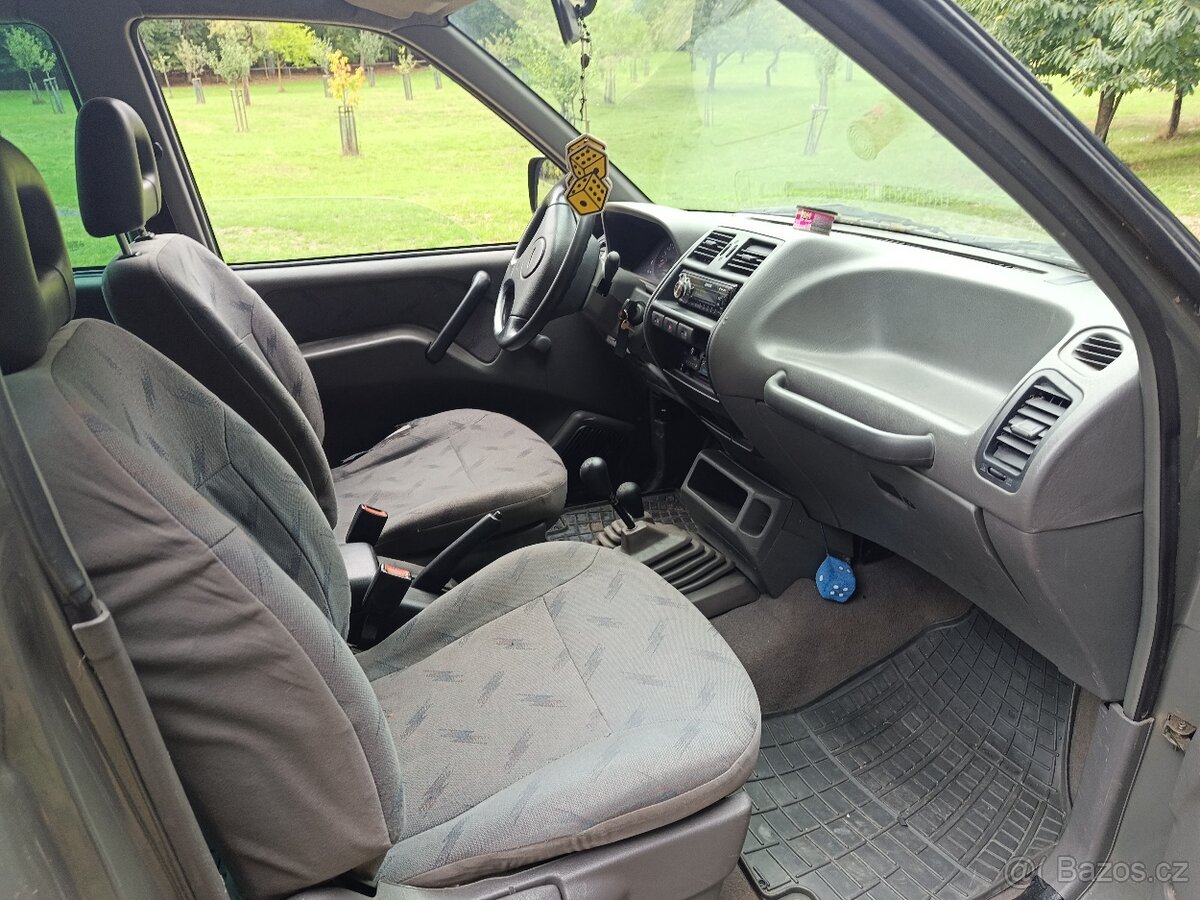 Ford Maverick 2,4 i - 13