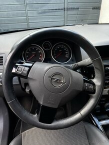 Opel Astra GTC 1.6 - 13