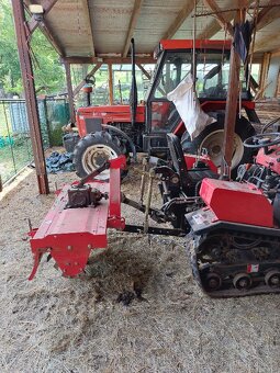 Nový multifunkční pásový traktor - 13