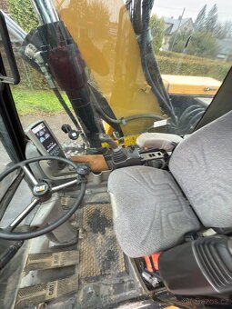 Kolový rypadlo Caterpillar M316D - 13