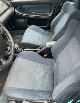 Mazda 323f 1.5 65 KW DOHC. Klima, el.okna, ALU kola - 13