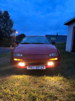 Mazda 323f - 13