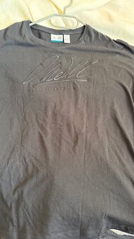 Dívčí trička vel. M - 13
