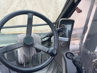 Kolový bagr Volvo EW140C - 13