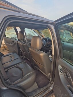 Mazda tribute  4x4 2.3i - 13