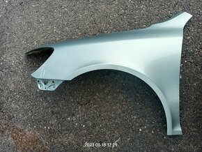 Skoda Octavia 2 facelift - přední nárazník, blatník - 13