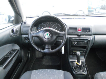 Škoda Octavia 1.9 TDi 74Kw TOUR - 13