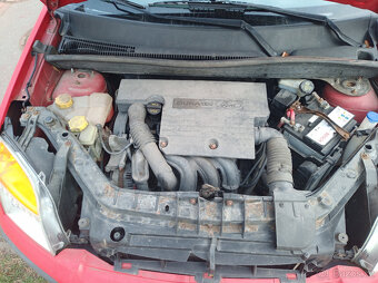 Ford Fusion 1,4 benzín 54kw 2009 - 13