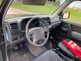 Prodám Suzuki Jimny Cabrio 1.3i 59kw/80K 4x4 - 13