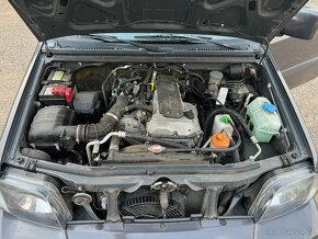 Prodám Suzuki Jimny 4x4 1,3 benz 63 KW rv 2010 - 13