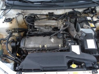 Mazda 323 F 1.3 i - 13